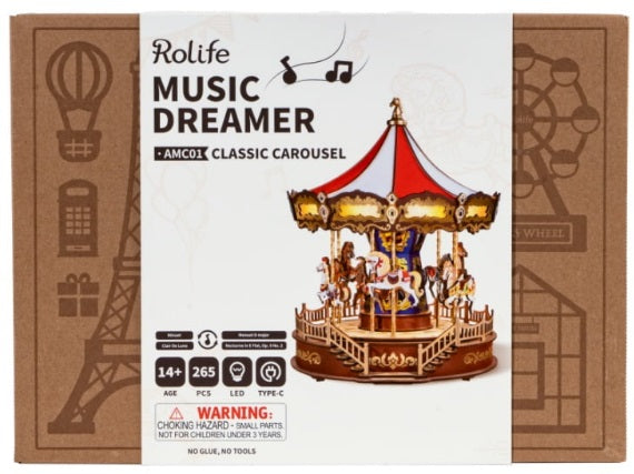 Packaging for Rolike Music Dreamer Classic Carousel 3D Wooden Puzzle featuring an illustration of a classic carnival ride with wooden horses and a red and yellow carousel structure.