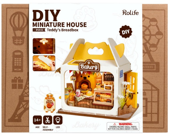 Breadbox shaped miniature kit with detailed bakery interior.