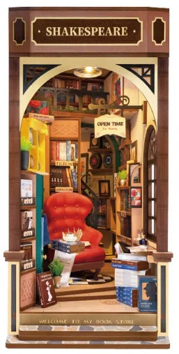 Assembled book nook kit with a red chair inside 