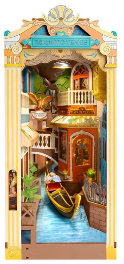 Scene of a gondola going through Venice.