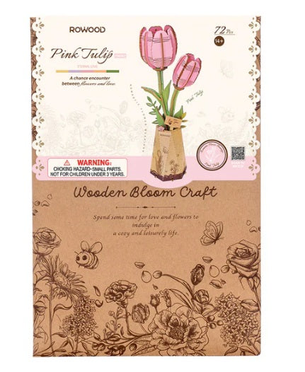 Package for pink tulips made of laser cut wood.