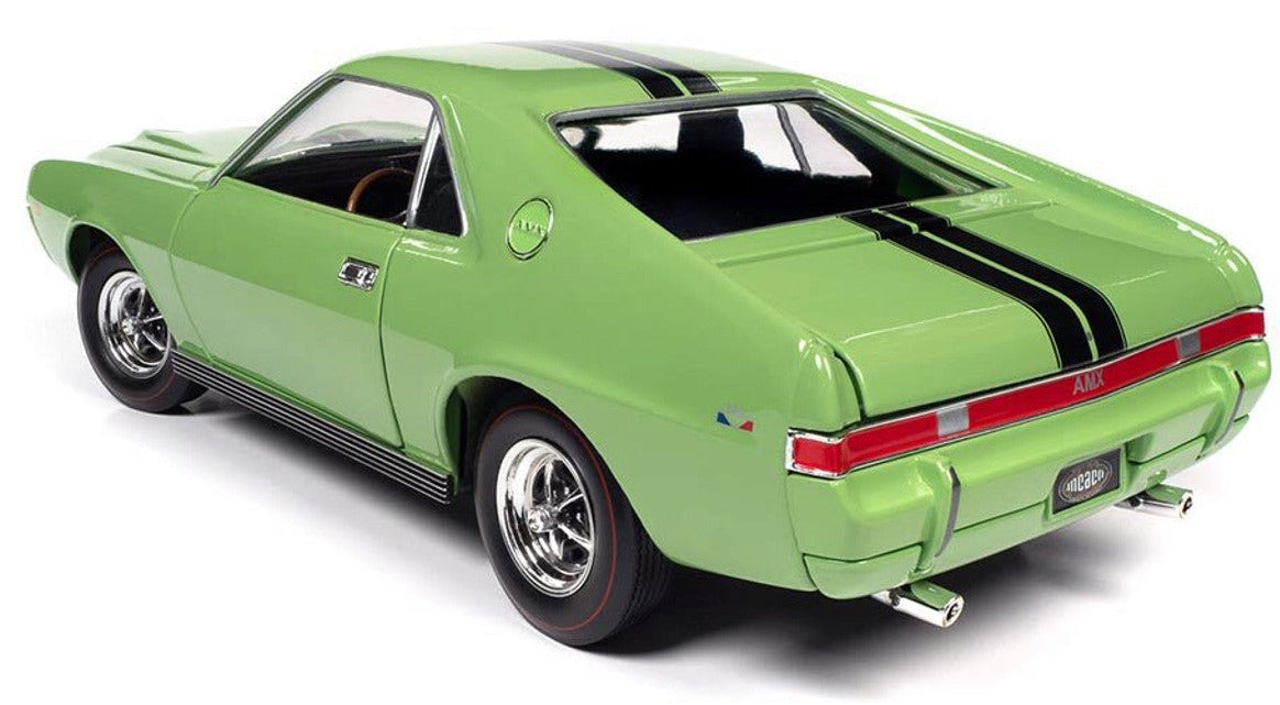 A 1/18 scale diecast model of a green 1969 AMC AMX  with two black stripes down the roof and trunk.