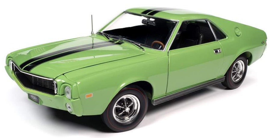 A 1/18 scale diecast model of a green 1969 AMC AMX  with two black stripes down the hood and roof.
