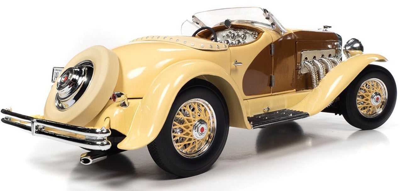 A 1/18 scale model of a 1935 Duesenberg SSJ Speedster in yellow and brown.