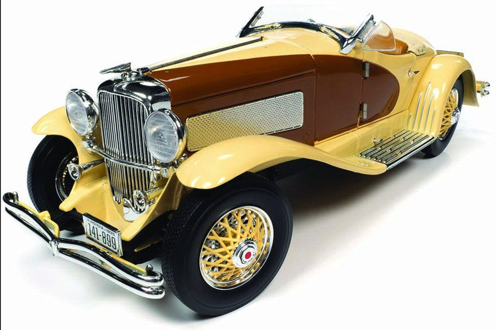 A 1/18 scale model of a 1935 Duesenberg SSJ Speedster in yellow and brown.