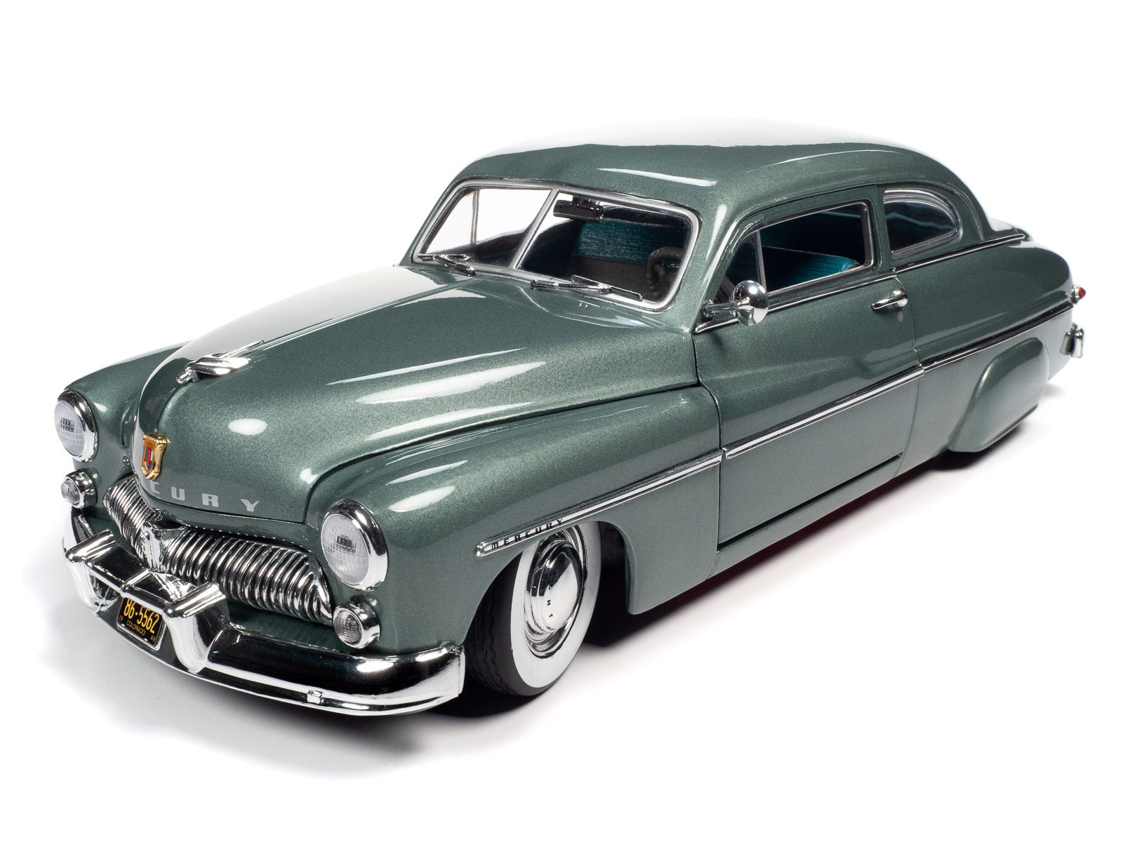 A 1/18 scale model of a 1949 Mercury Eight Coupe in Berwick Green color.