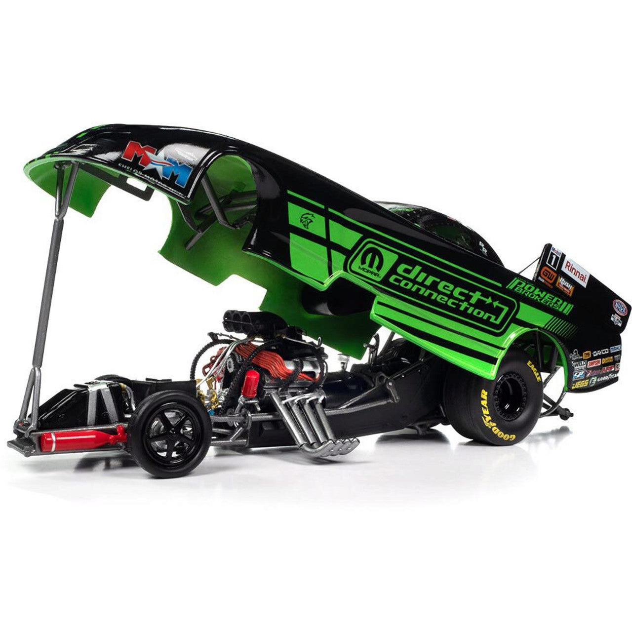 2023 NHRA Funny car in black and green paint scheme with body lifted over the chassis.