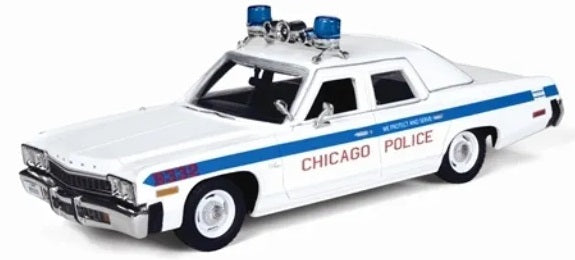 Scale model of 1974 Dodge Monaco Chicago Police car with lights and horns on the roof and blue stripe down the side.