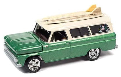 1/64 scale model of a green Chevy Suburban with surf boards on the roof.