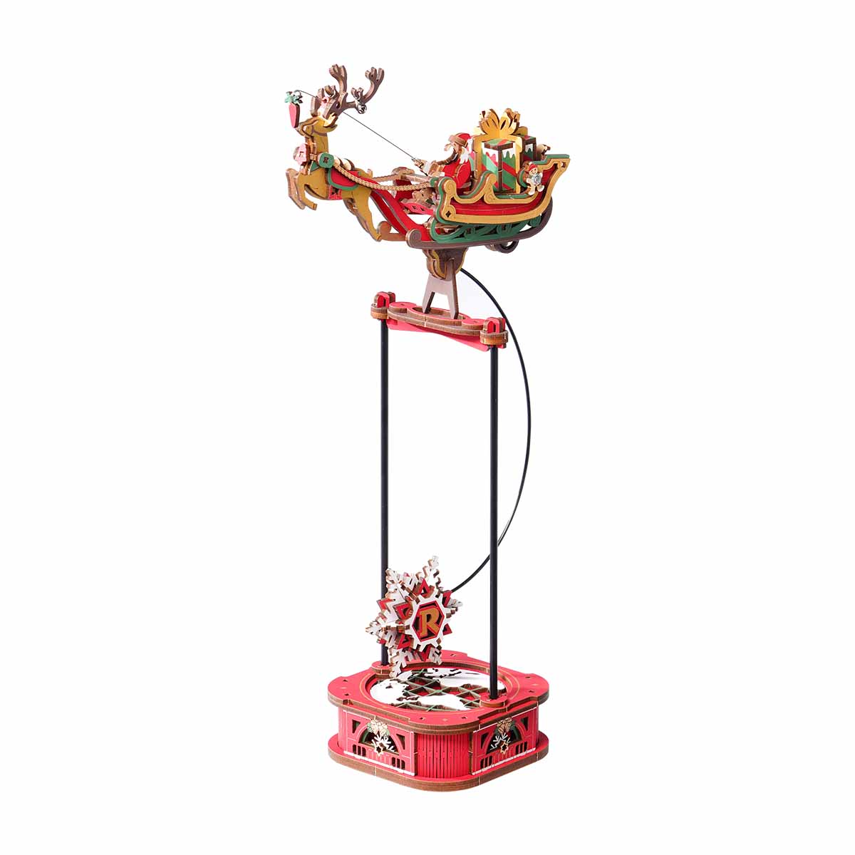 Decorative model of Santa Claus in a sleigh pulled by reindeer on a white background