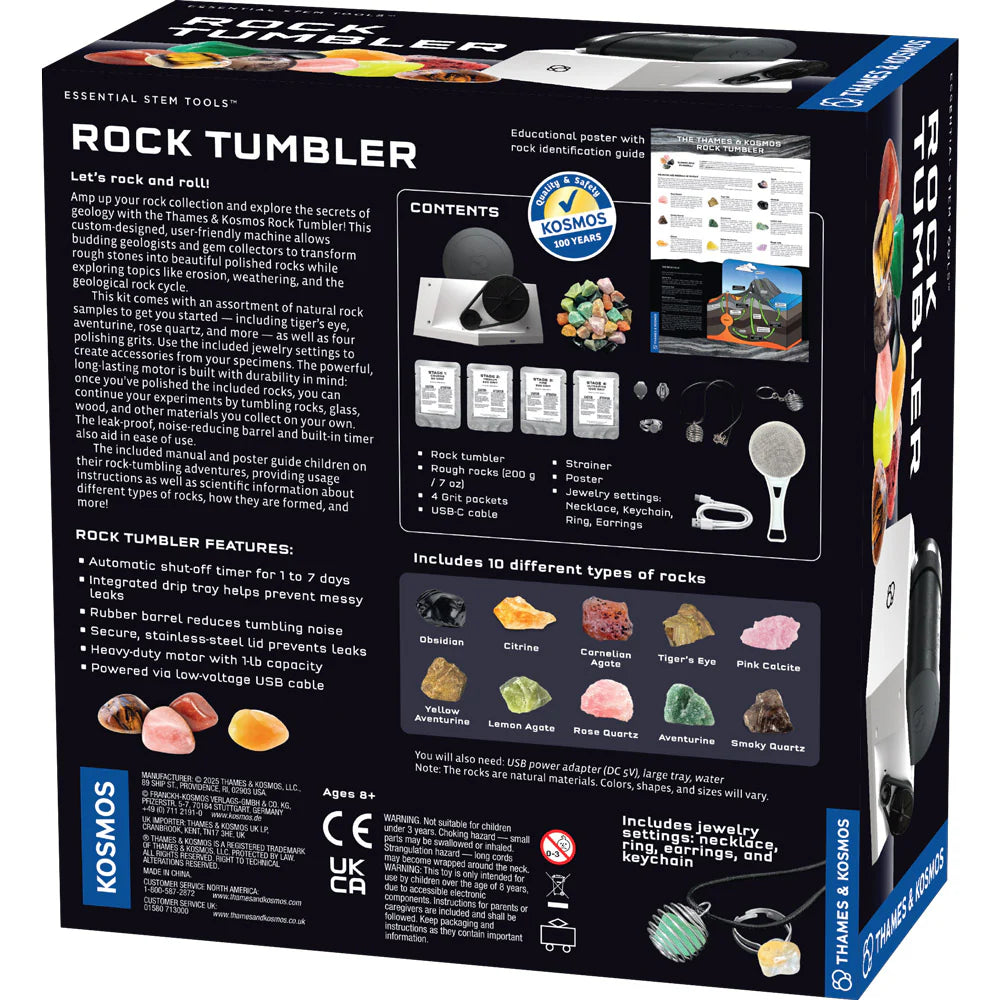 Colorful rocks and rock tumbler on a black package.