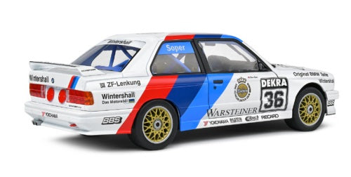 1/18 scale model of a BMW E30 M3 with racing graphics.