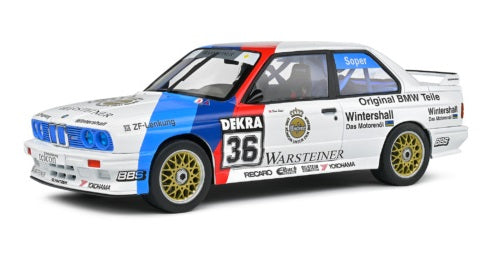 1/18 scale model of a BMW E30 M3 with racing graphics.