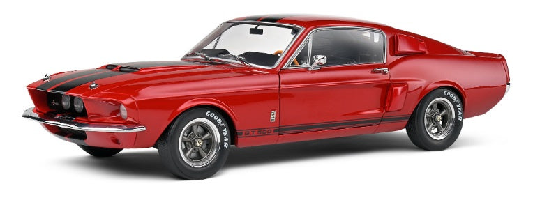 1/18 scale model of a red Shelby GT500 with black stripes.