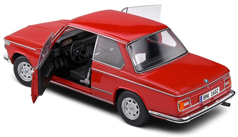 A 1/18 scale diecast model of a red BMW 602 Verona with open doors, hood, and trunk.
