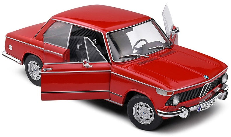 A 1/18 scale diecast model of a red BMW 602 Verona with open doors, hood, and trunk.