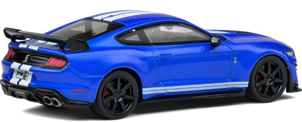 A 1/43 scale model of a blue 2020 Ford Shelby Mustang GT500 with black rims and white stripes.
