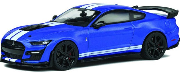 A 1/43 scale model of a blue 2020 Ford Shelby Mustang GT500 with black rims and white stripes.