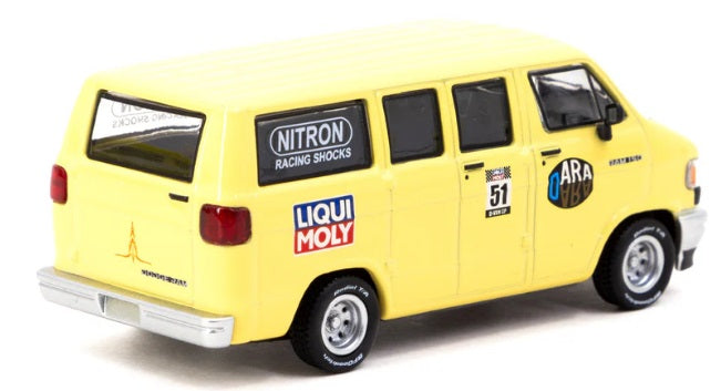 1/64 scale diecast of yellow Dodge van with decals on sides and Hood.