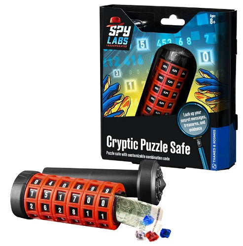 Open Cryptic Puzzle Safe toy with money and jewels spilling out and package in background.