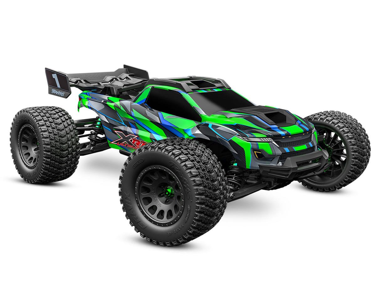 Green and black remote control monster truck on a white background