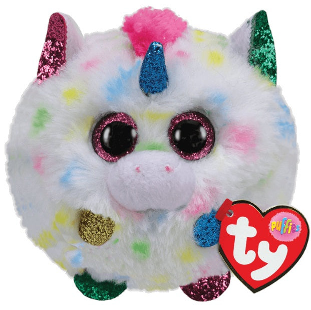 Round unicorn with multicolored spots and glitter covered ears, horn, and feet.