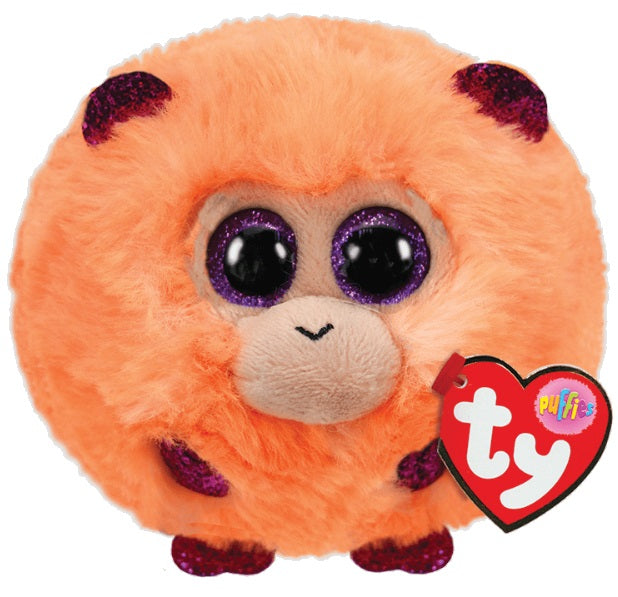 Round orange monkey with red heart shaped tag.