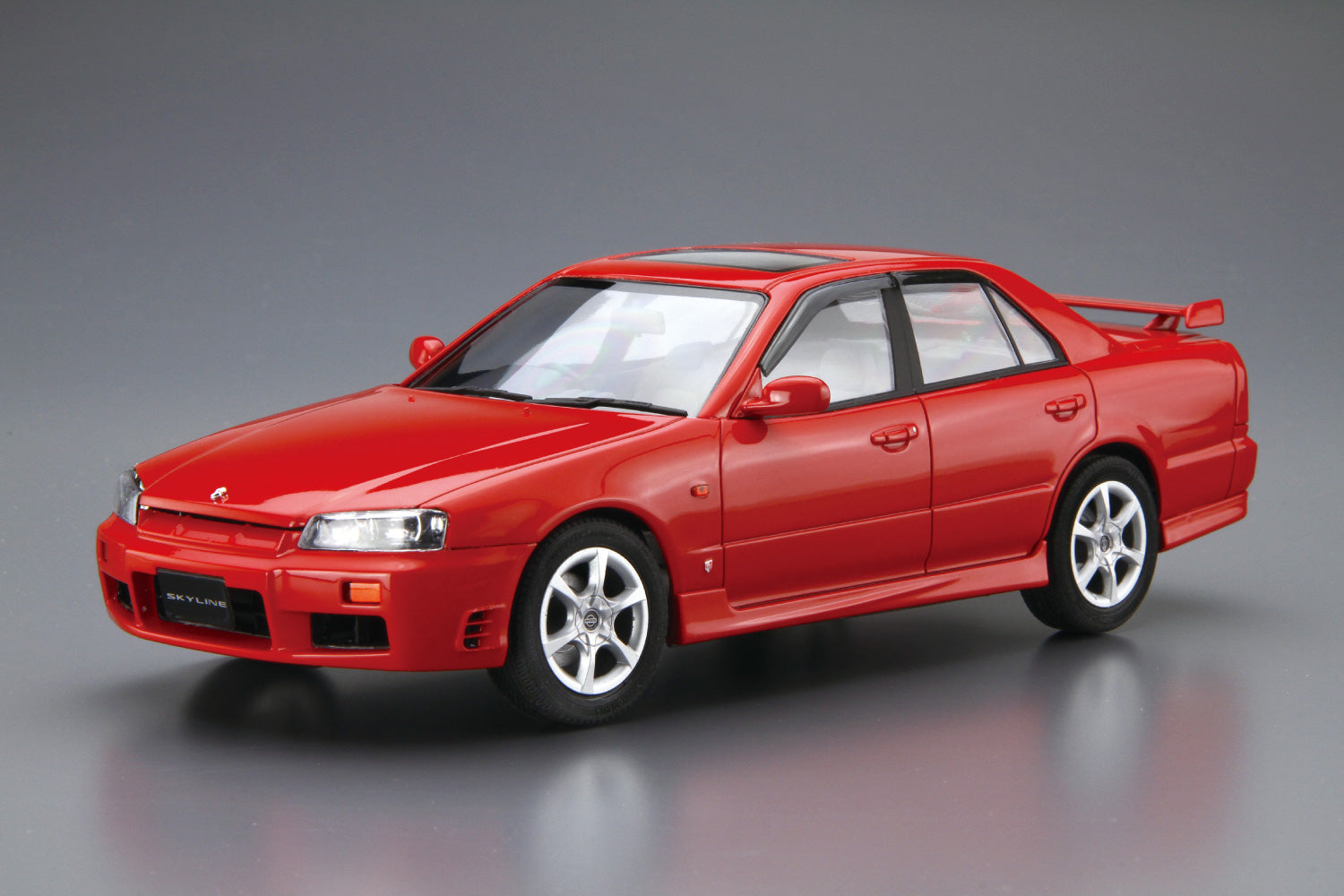 Plastic Model of a Nissan Skyline painted red.