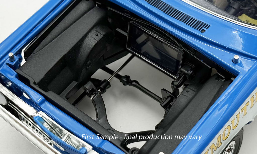 Close up of under the hood of 1/18 scale model car.