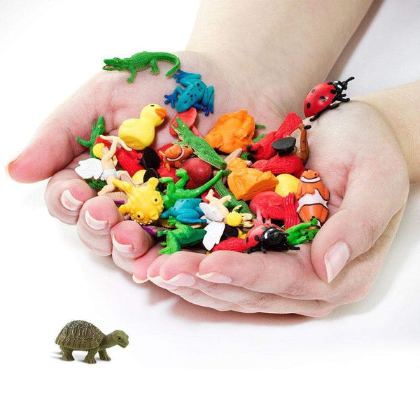 Two hands filled with good luck mini animals