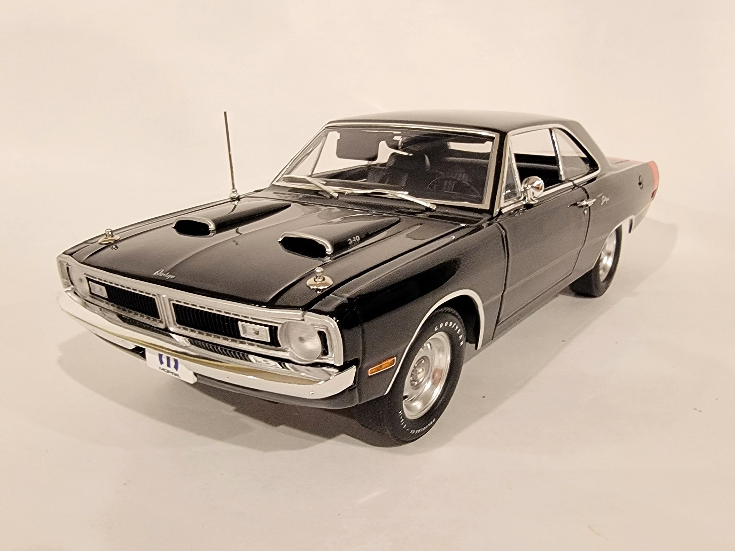 A 1/18 Scale Diecast model of a 1970 Dodge Dart Swinger 340