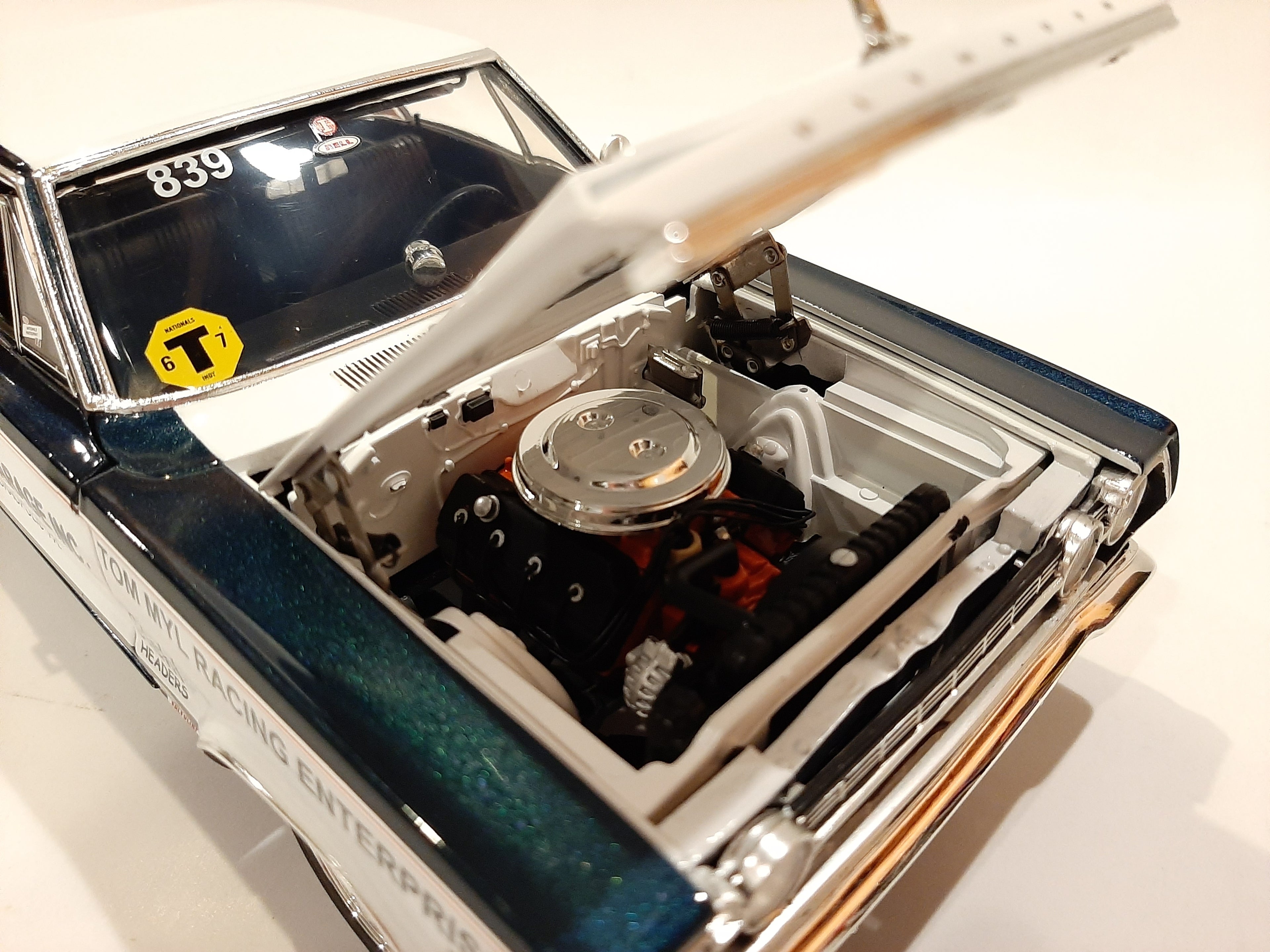 Under the hood of 1/18 scale diecast model car of racing 1967 Plymouth Belvedere