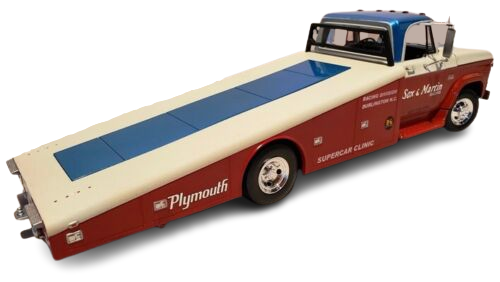 A 1/18 scale model of a 1970 Dodge D300 Sox & Martin Ramp Truck in red, white, and blue colors.