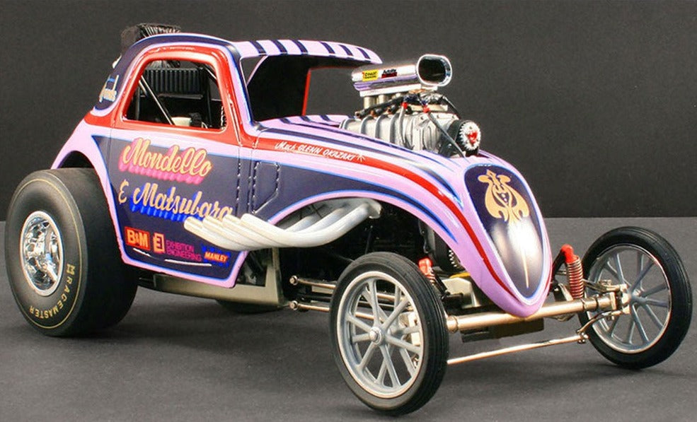 A 1/18 scale model of a Mondello & Matsubara Striped Altered Dragster in multiple colors with engine coming through the hood.