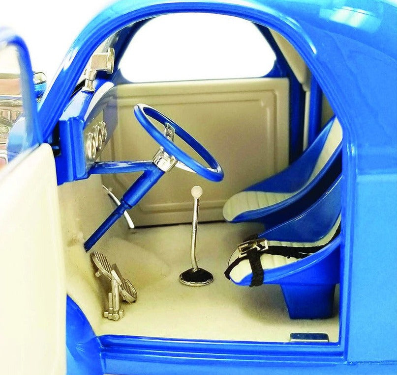 Interior of diecast model car of 1940 Ford Gasser in blue.