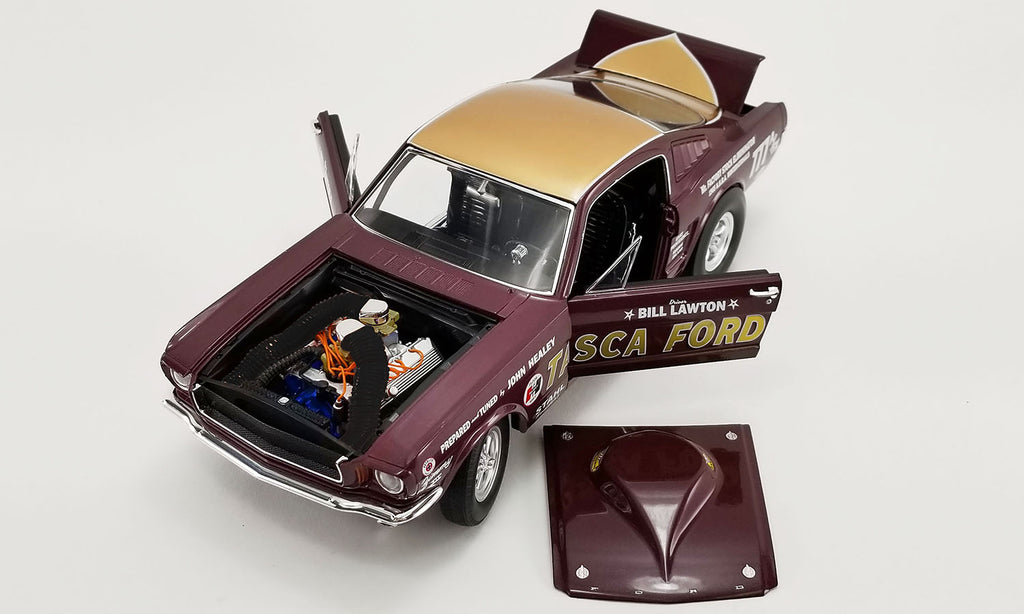 1/18 scale diecast model car of 1965 Ford Mustang showing opening doors, trunk, and removable hood.