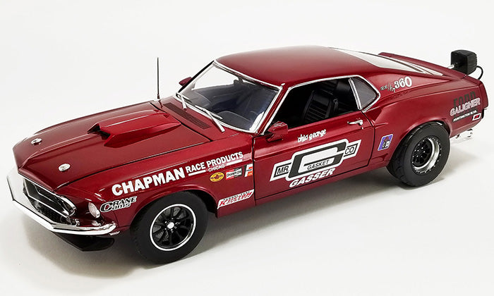 1/18 scale model of a red 1969 Ford Mustang Boss 429 with race graphics on the side.