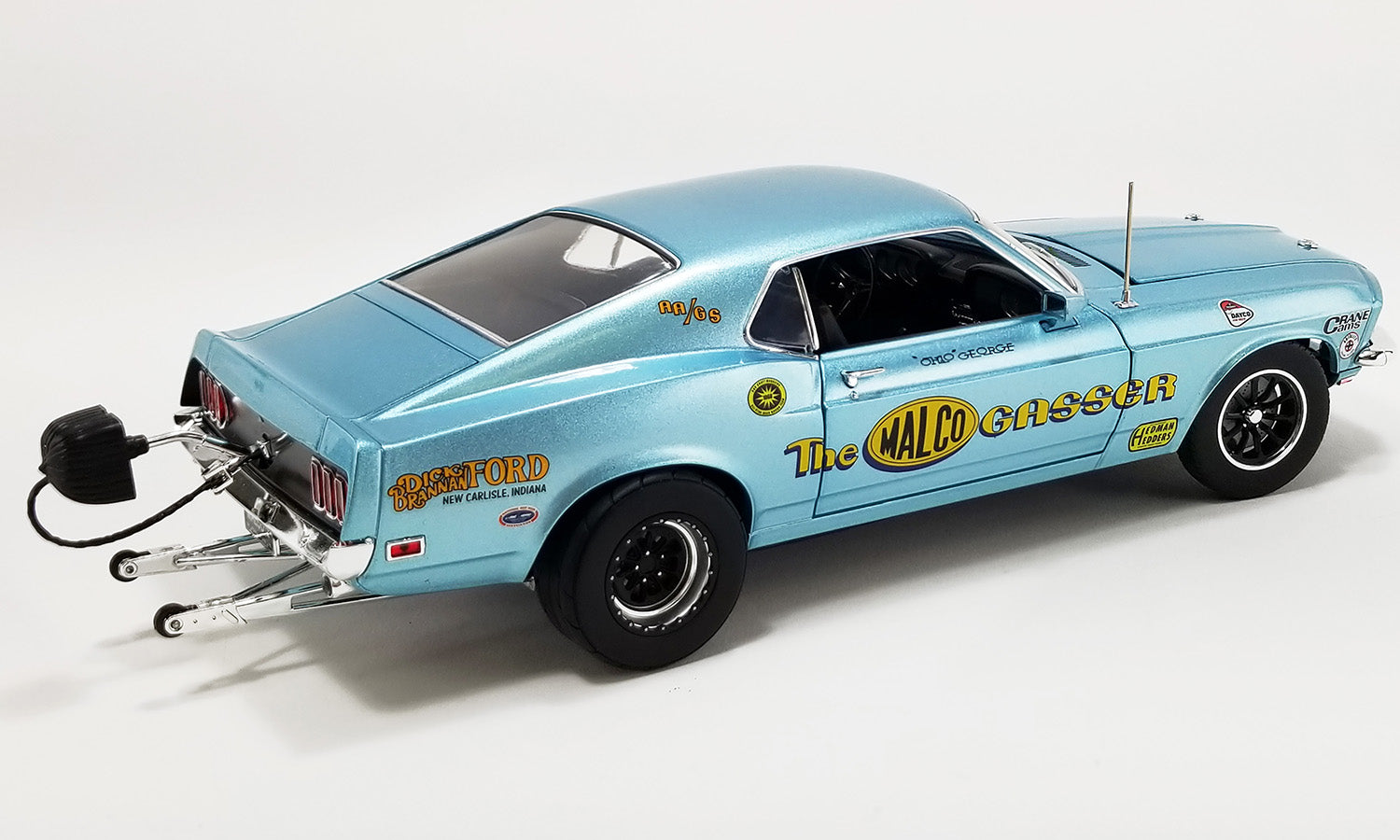 1/18 scale diecast model car of 1969 Ford Mustang with "The Malco Gasser" and other racing graphics on the side.