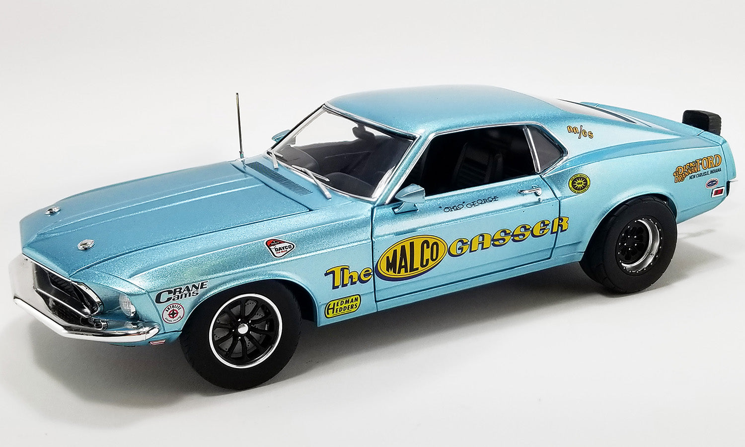 1/18 scale diecast model car of 1969 Ford Mustang with "The Malco Gasser" and other racing graphics on the side.