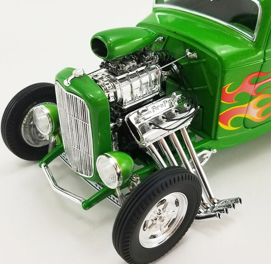 A close up of a blown Hemi engine in agreen 1/18 scale model of a 1932 Ford Hot Rod.