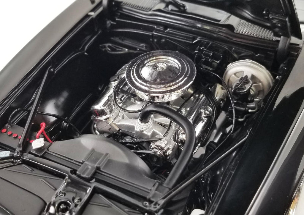 Close up of engine on a diecast model car.