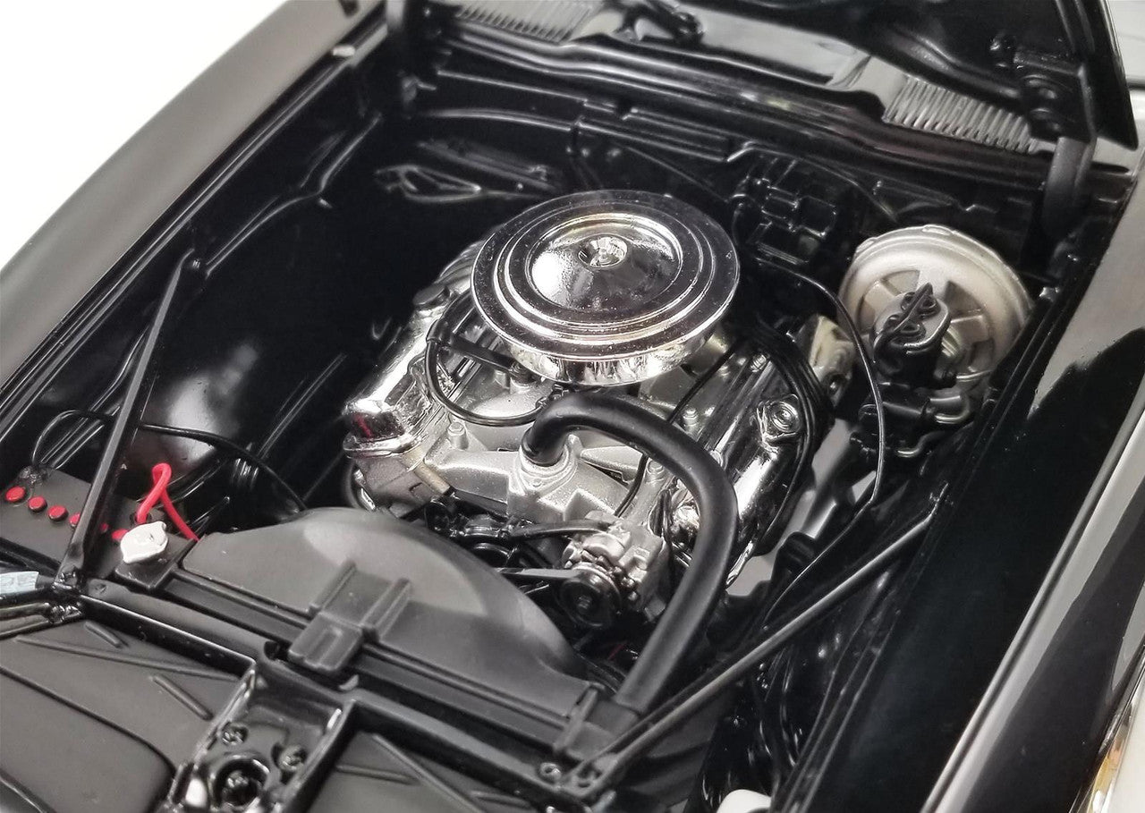 Close up of engine on a diecast model car.