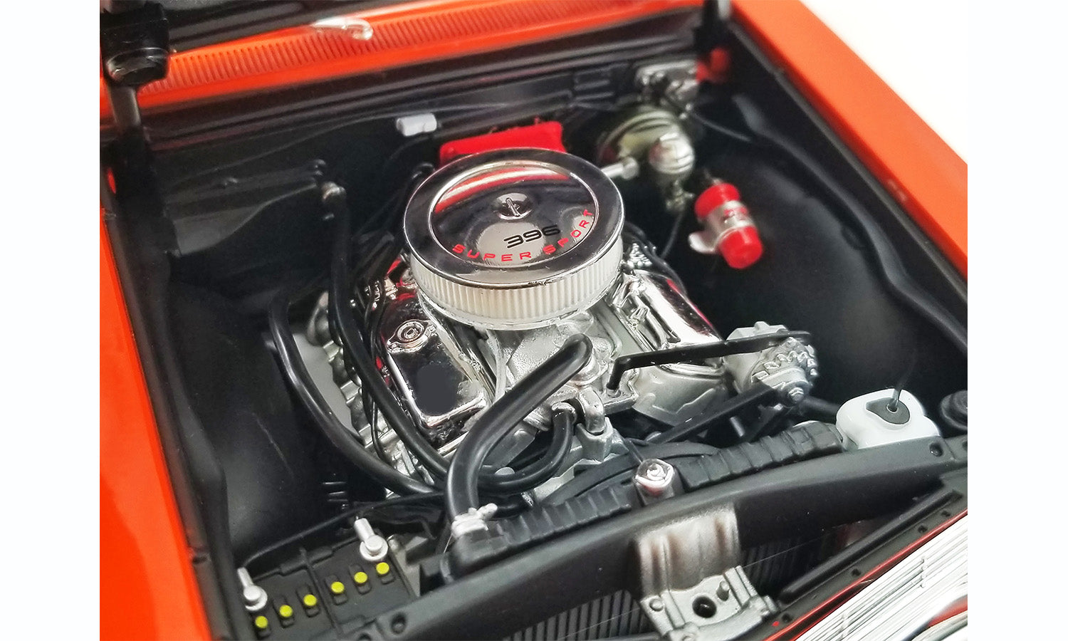 Close up of the engine on a diecast model car.