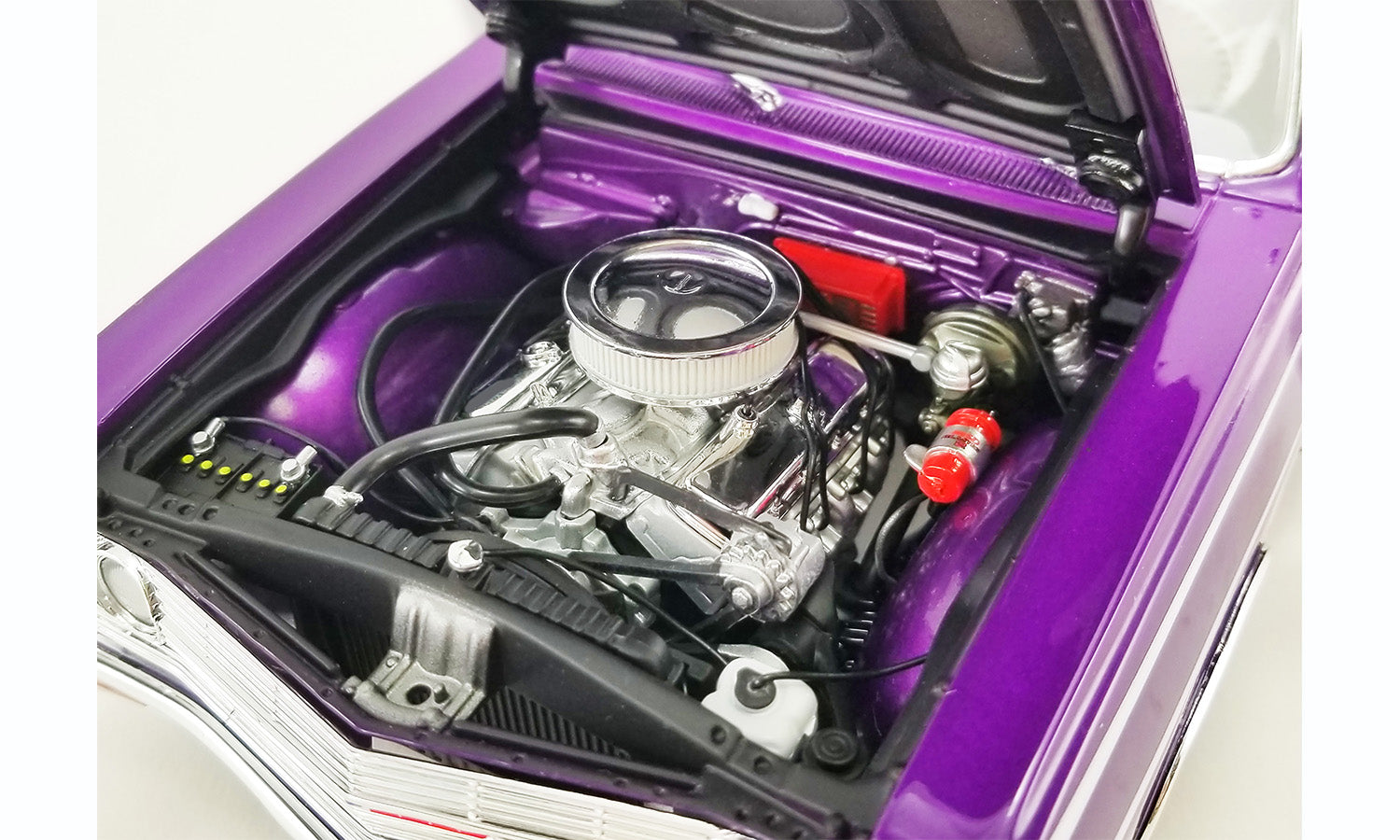 Close up of the engine in a diecast model car.