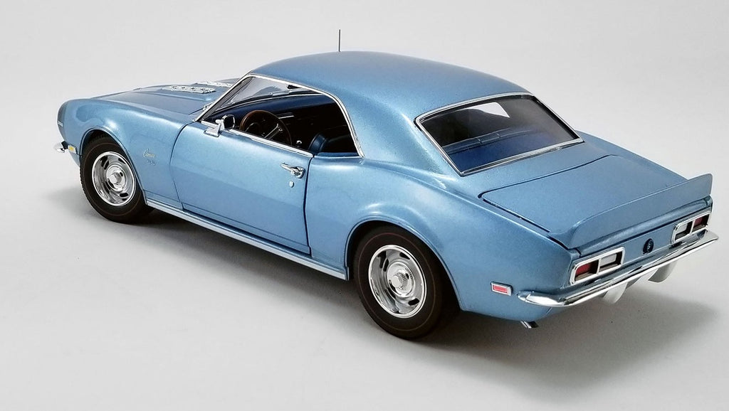 1/18 scale model of a 1968 Chevy Camaro Unicorn Coupe in light blue color.