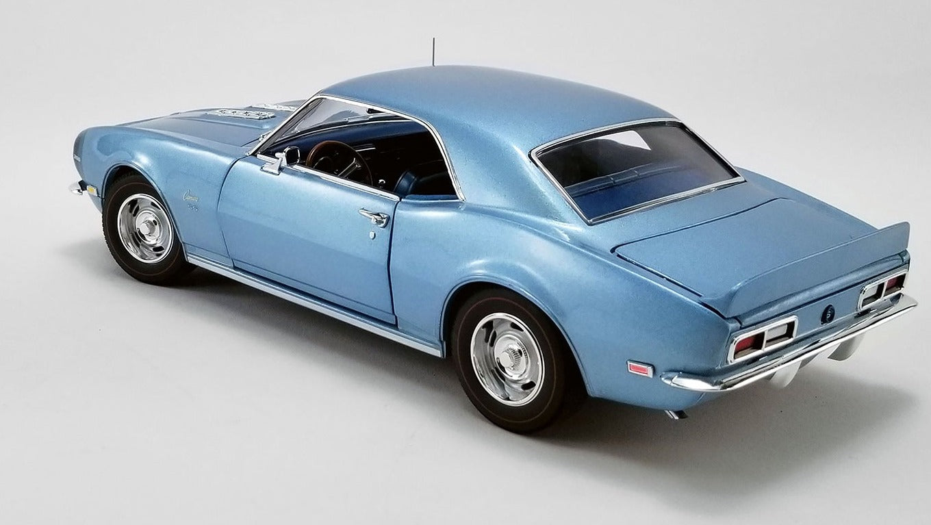 1/18 scale model of a 1968 Chevy Camaro Unicorn Coupe in light blue color.