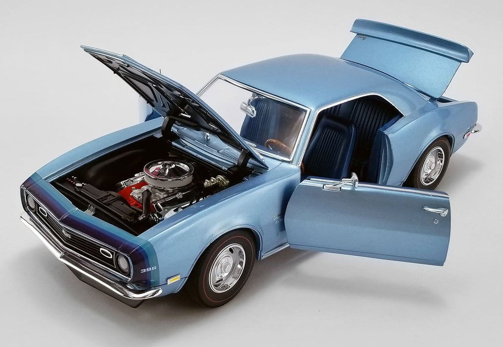 1/18 scale model of a 1968 Chevy Camaro Unicorn Coupe in light blue color with opening hood, doors, and trunk.