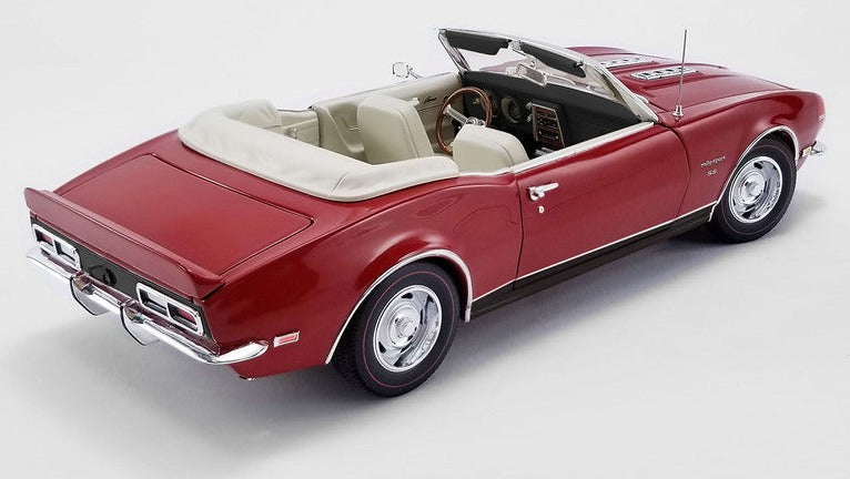 1/18 scale model of a red 1968 Chevrolet Camaro with open convertible top.