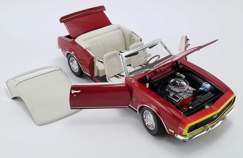 1/18 scale model of a red 1968 Chevrolet Camaro showing open doors, hood, and trunk and removable convertible top.