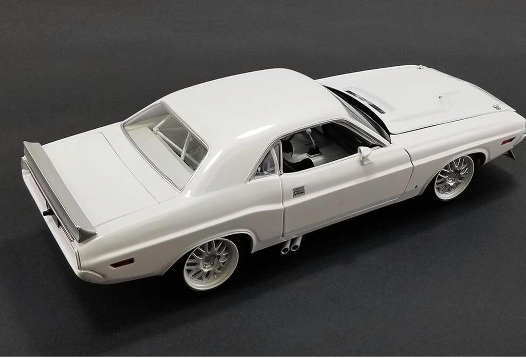 A 1/18 scale model of a 1970 Dodge Challenger SF Kowalski in white color.